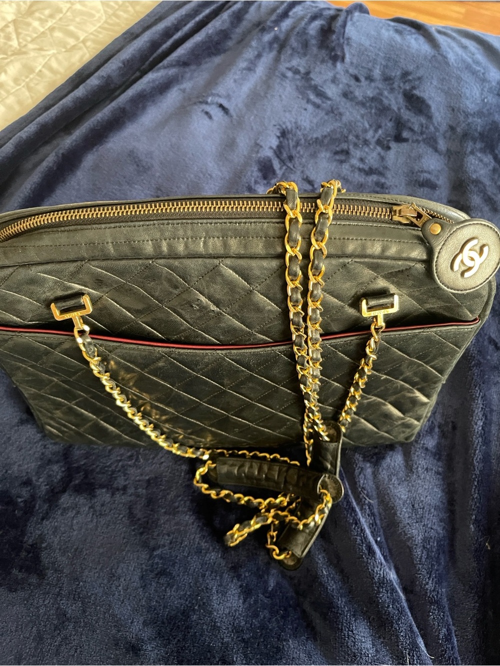 CHANEL Black Quilted Leather Tote with Gold Chain and Red Trim